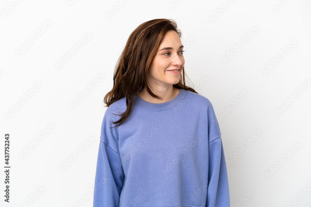 Young caucasian woman isolated on white background looking side