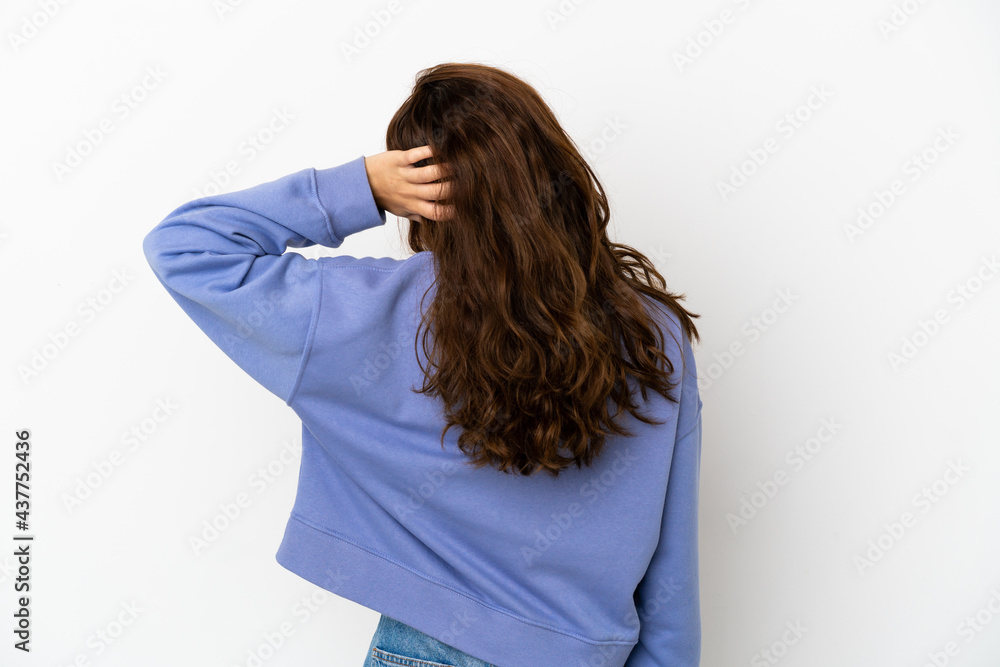 Young caucasian woman isolated on white background in back position and thinking Young caucasian woman isolated on white background in back position and thinking