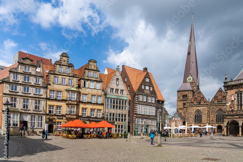 colorful old guild houses on the market square in the historic old city center of Bremen with the Church Our Lady behind