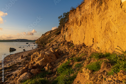 Evening light over the beach and cliffs in Klein Zicker, Mecklenburg-Western Pomerania, Germany