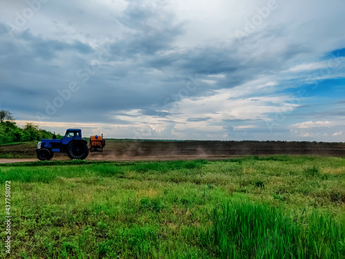 tractor on the background of the field