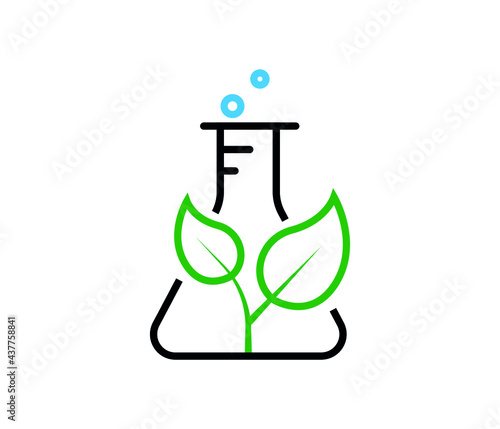 green leaf symbol in natural research laboratory bottle