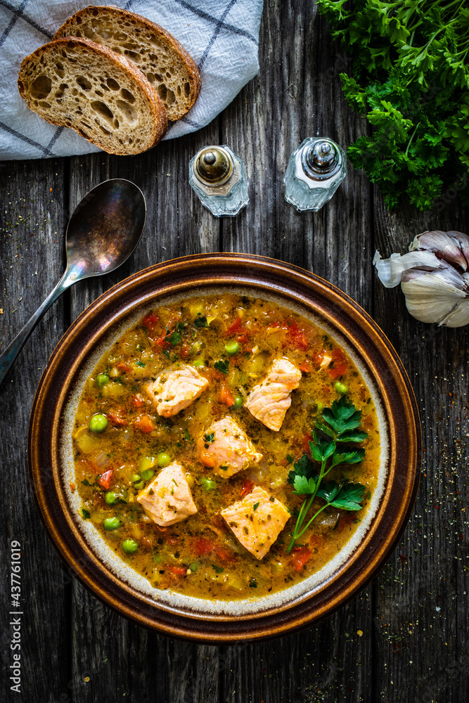Fish soup on wooden table
Fish soup on wooden table