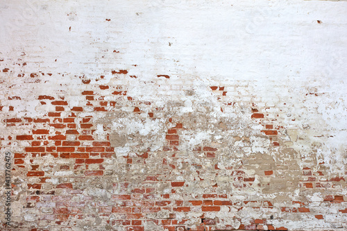 old ruined red brick wall