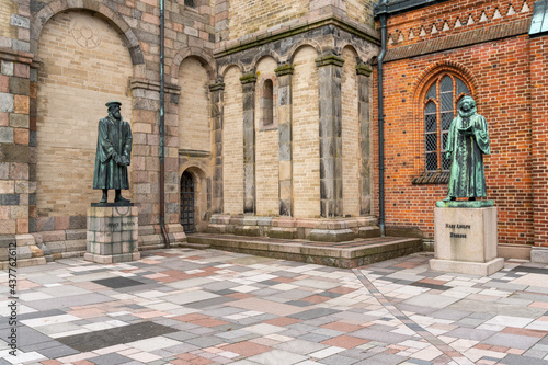 statues of leading theologists outside of the cathedral of Ribe photo