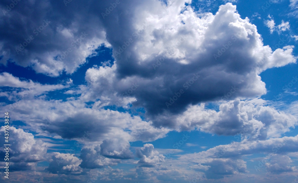 Beautiful contrasting large clouds in blue sky for background Beautiful contrasting large clouds in blue sky for background