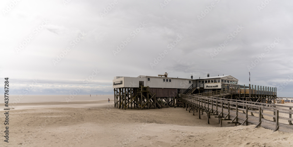 view of the historic Arche Noah Restaurant on the Wadden Sea beachfront