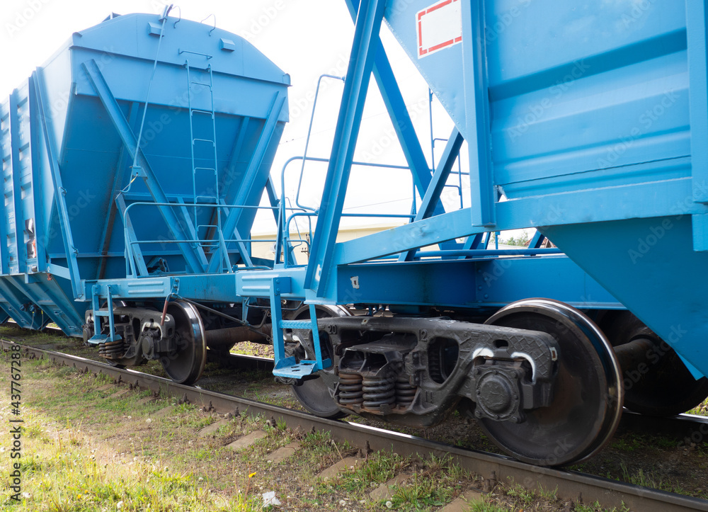 Undercarriage of a train carriage, wheels of a freight train close-up. Undercarriage of a train carriage, wheels of a freight train close-up.