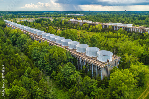 Abandoned Nuclear Power Plant Cooling Towers in the Forest photo