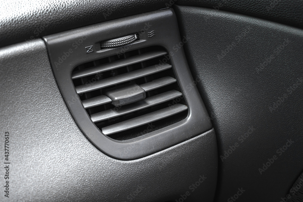 Air condition in the car, adjusting the car heater, black interior background Air condition in the car, adjusting the car heater, black interior background