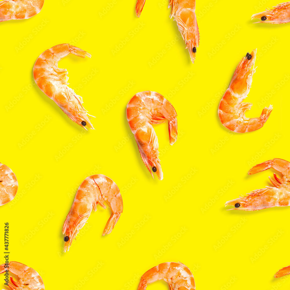 Seamless pattern made from Prawn isolated on a yellow background. Tiger shrimp. Seafood seamless pattern with shrimps. seafood pattern Seamless pattern made from Prawn isolated on a yellow background. Tiger shrimp. Seafood seamless pattern with shrimps. seafood pattern