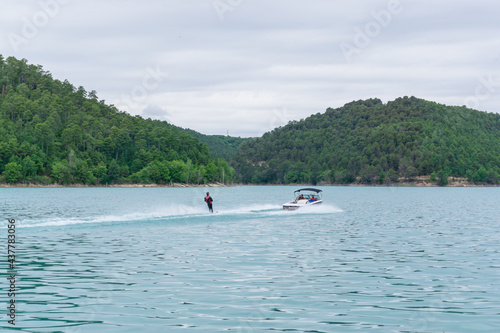 Man practicing water skiing in the San Ponç reservoir