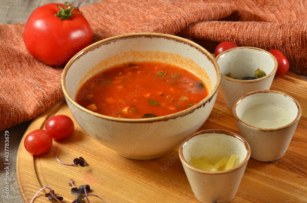 borsch, russian solyanka soup, national food on rustick background borsch, russian solyanka soup, national food on rustick background