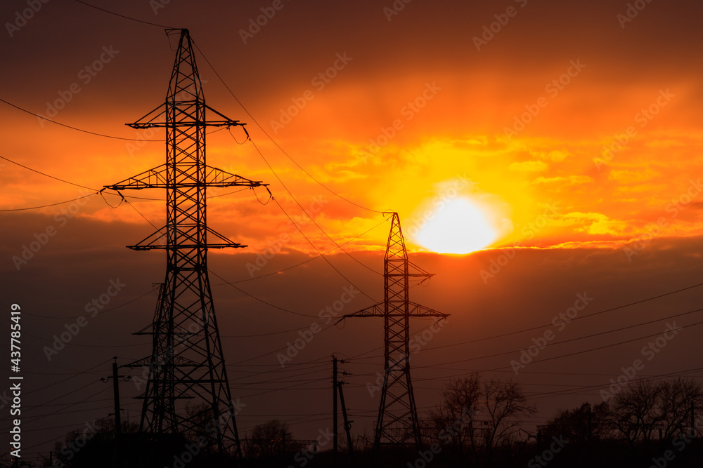 High voltage power line at sunset