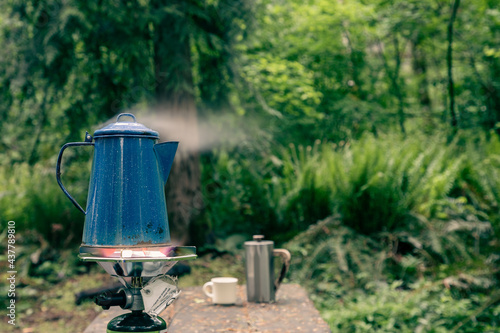 Steam Rises From Coffee Pot as water boils for Camp Coffee