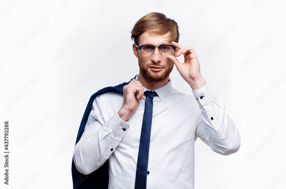 a man in a shirt with a jacket in his hands manager finance office a man in a shirt with a jacket in his hands manager finance office