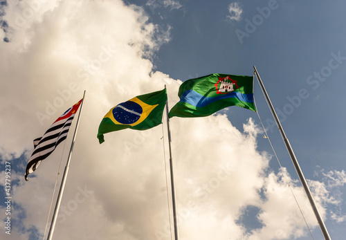 Sao Paulo, Brazil and Jundiai flags side by side photo