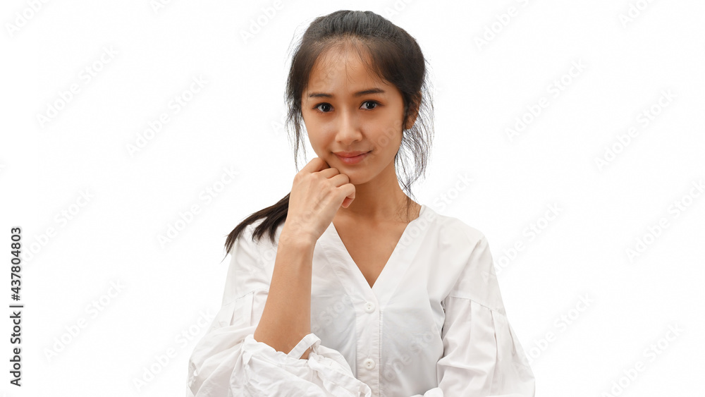 Half-length portrait of female in white shirt smiling and posting to camera isolated in white background Half-length portrait of female in white shirt smiling and posting to camera isolated in white background
