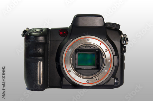 Digital SLR camera showing lens mount with mirror up, CMOS sensor is visible