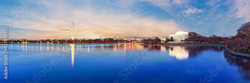 Jefferson Memorial and Washington Monument reflected on Tidal Basin in the morning, Washington DC, USA. Panoramic image © tanarch