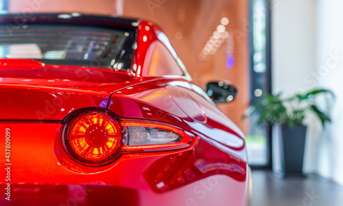modern car led tail lights in showroom