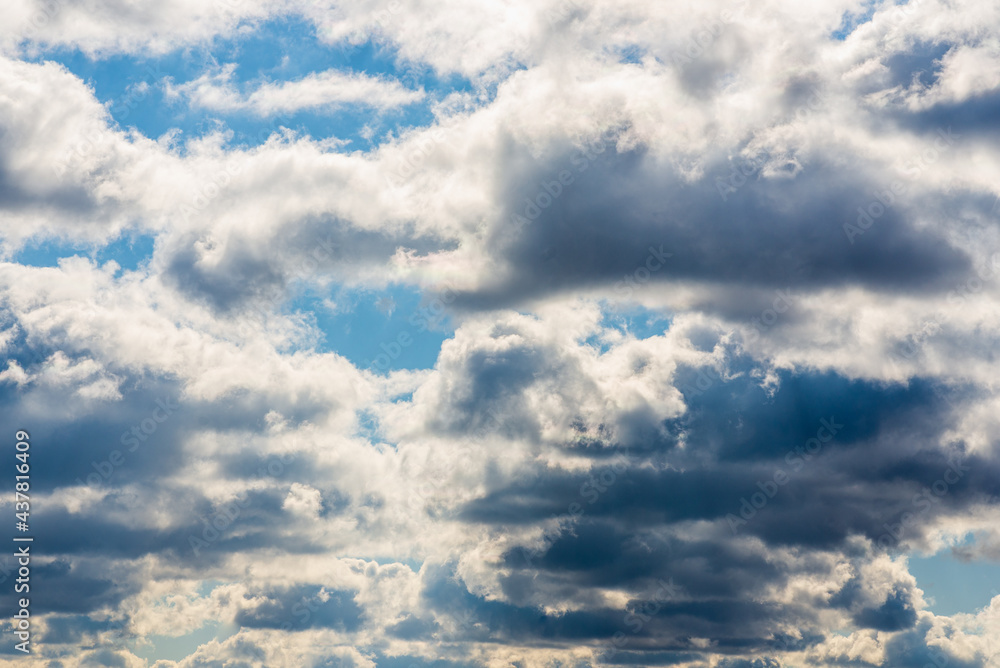 Obraz premium White fluffy clouds in the blue sky background.Cloudy white blue sky in the nice blue heaven sky.