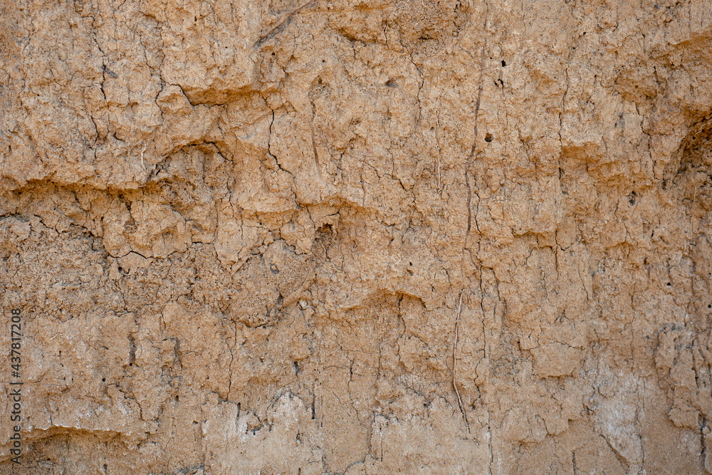 Brown clay wall. Clay surface texture, background for wallpaper. Brown clay wall. Clay surface texture, background for wallpaper.