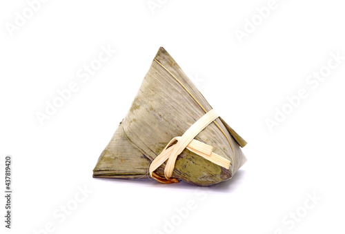 Sticky rice dumpling or Zongzi (Pyramid-shaped dumpling made by wrapping glutinious rice in bamboo leaves) for Chinese Boat dragon festival (5th Lunar month, Duanwu festvial). Isolated on white photo