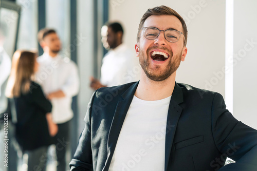 Portrait of cheerful man in the office