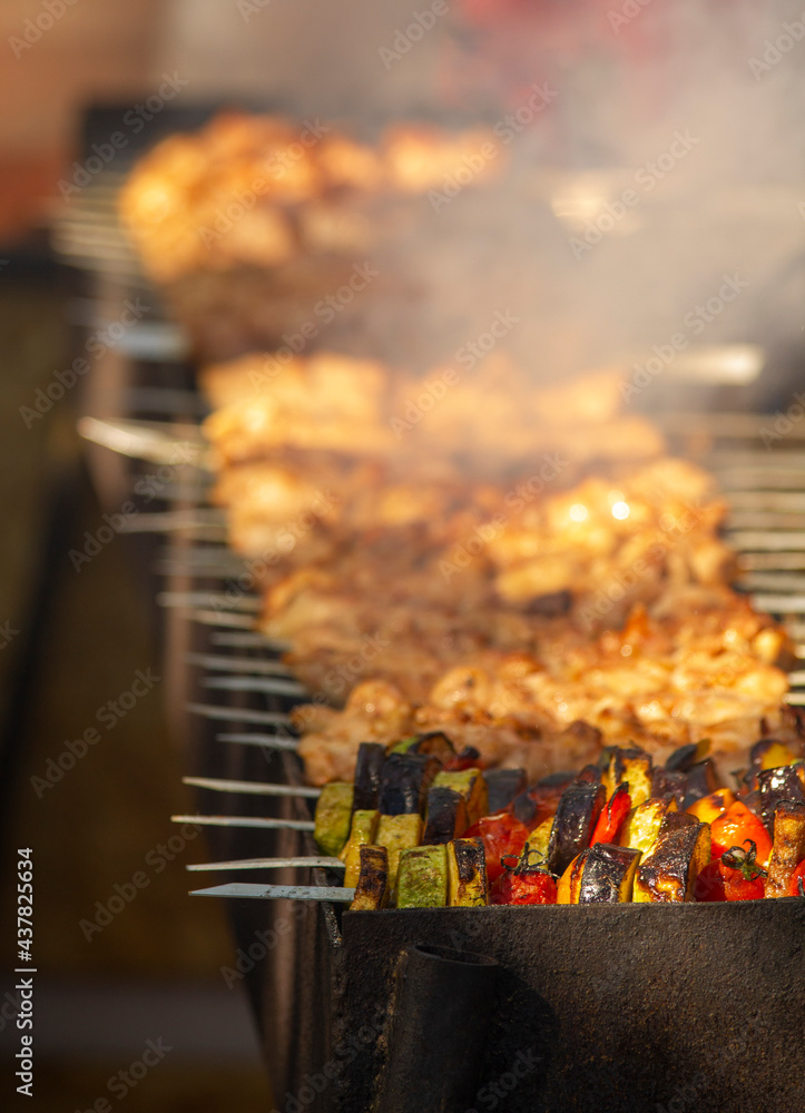 Cooking meat on open fire. Meat and vegetable national traditional dishes. Cooking meat on open fire. Meat and vegetable national traditional dishes.