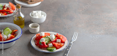 Mediterranean salad with vegetables and cheese.Greek salad with tomatoes  sweet pepper  cucumbers  and feta Rage image for banner.