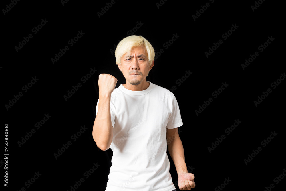 white hair middle aged Asian man with funny face and excitement gesture on black background. white hair middle aged Asian man with funny face and excitement gesture on black background.