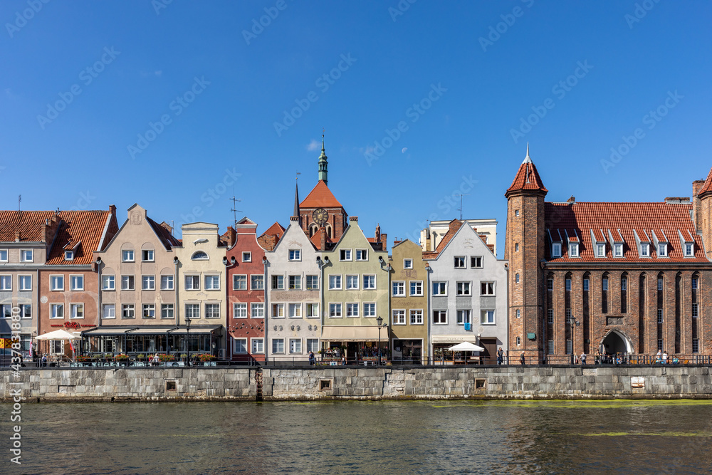 Gdansk, Old Town - historic tenement houses with gables on the banks of the River Motlawa, Poland