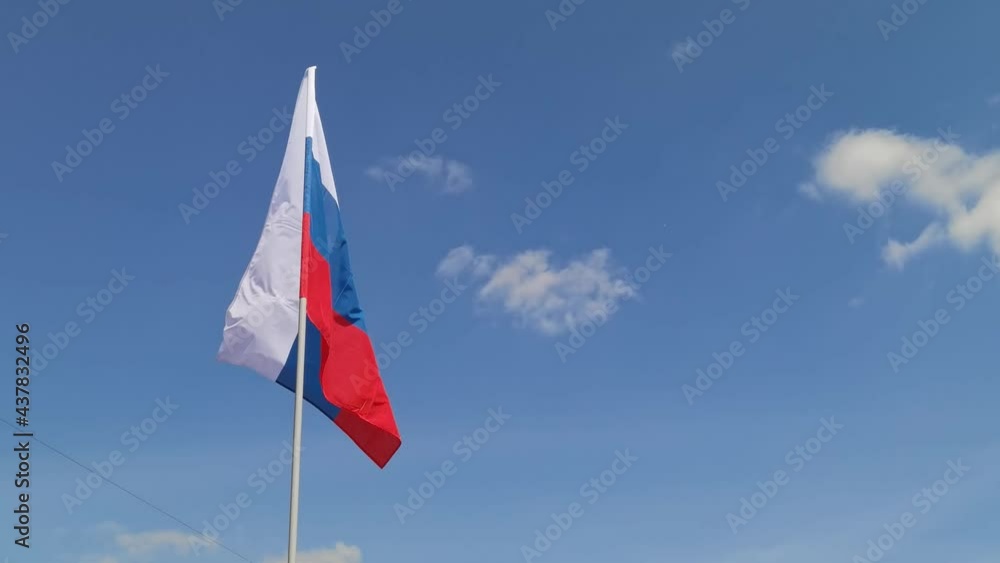 Russia. National country flag on blue sky background. Flying fabric symbol. Tourism or travel summer day. international patriotic emblem. Nobody. Horizontal video Russia. National country flag on blue sky background. Flying fabric symbol. Tourism or travel summer day. international patriotic emblem. Nobody. Horizontal video