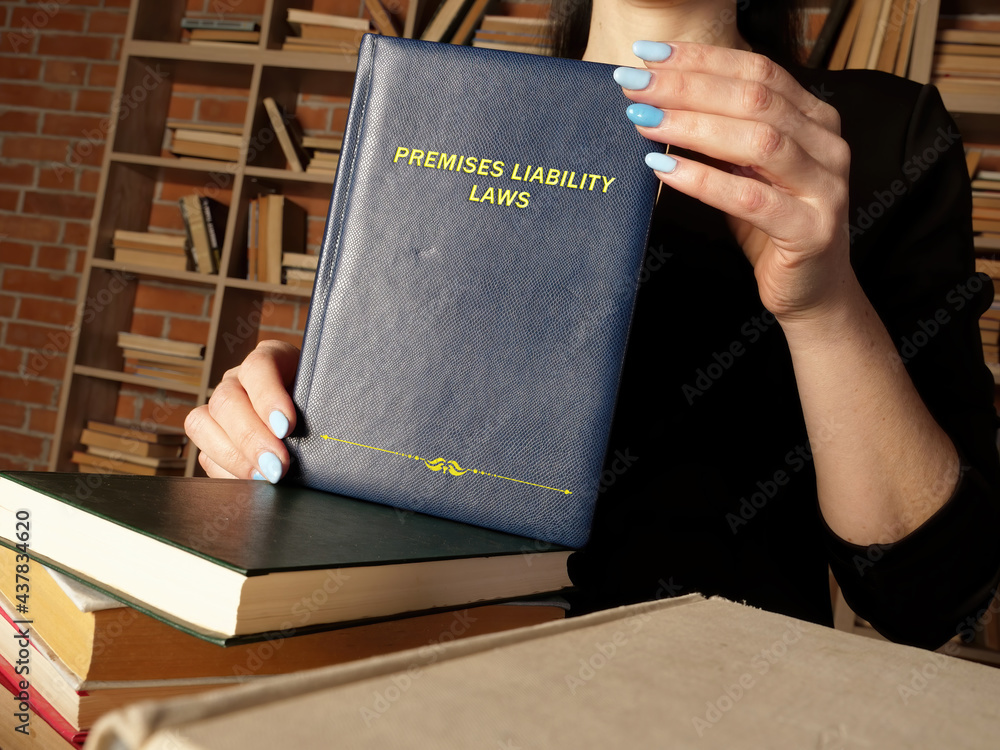  PREMISES LIABILITY LAWS inscription on the sheet. A premises liability lawsuit holds a property owner responsible for any damages arising out of an injury on that person - obrazy, fototapety, plakaty 