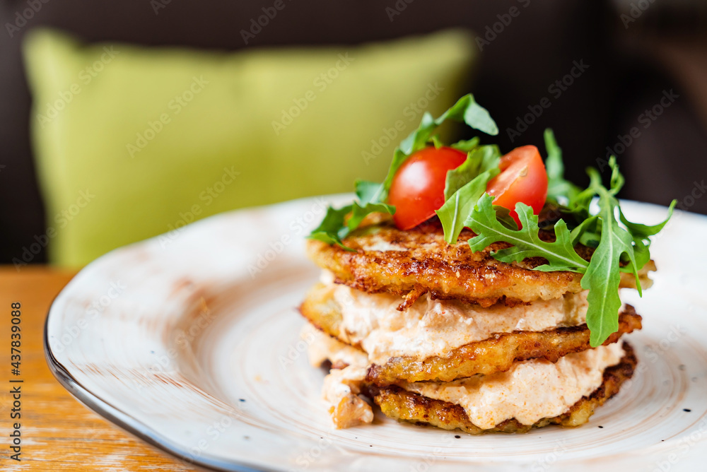 potato pancakes with sauce and vegetables potato pancakes with sauce and vegetables