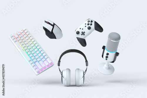 Flying gamer gears like mouse, keyboard, joystick, headset, VR, microphone