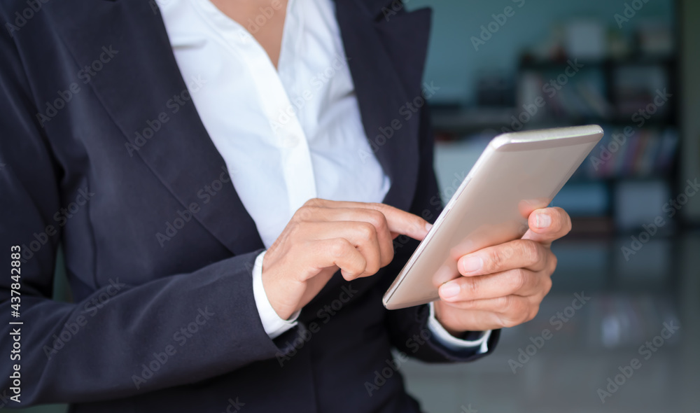 Staff business woman use mobile or smartphone for work in office.good signal wifi 5G. technology internet network for business concept. Staff business woman use mobile or smartphone for work in office.good signal wifi 5G. technology internet network for business concept.