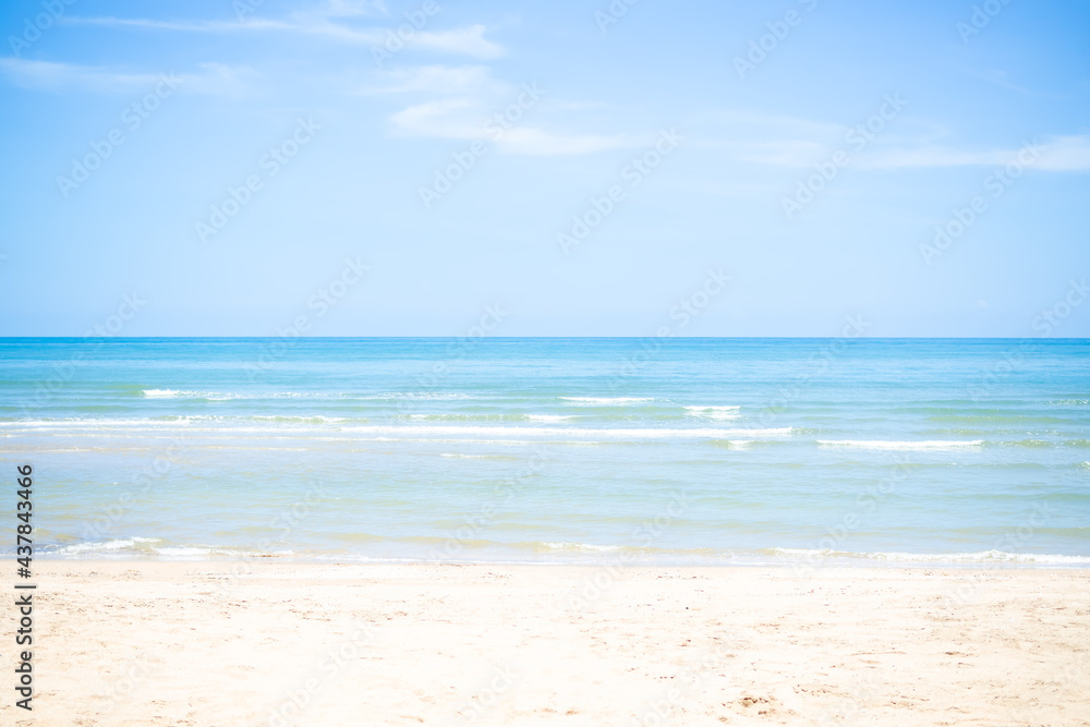 Sand beach soft wave at coast with blue sea and blue sky. nature ocean outdoor. tropical tourist vacation summer travel in holidays concept.