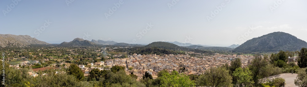 Panorama city town of pollenca or pollensa in mallorca with mountain scenery background