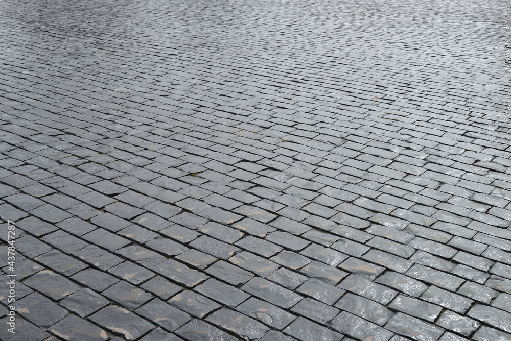 Old cobblestone pavement closeup.