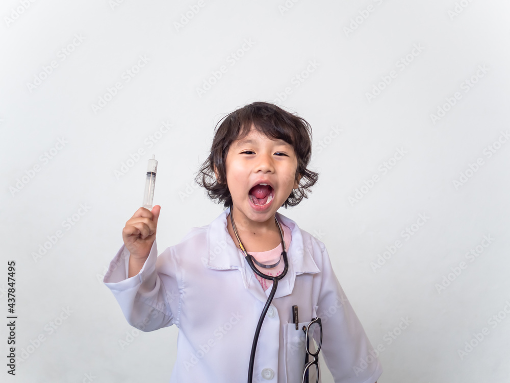 kid girl playing wear white uniform and stethoscope, doctor kid standing on white copy space, leaning and education for chlidren. school and develop a child for future. kid girl playing wear white uniform and stethoscope, doctor kid standing on white copy space, leaning and education for chlidren. school and develop a child for future.
