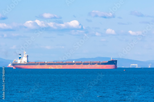 Empty container freighter ship waiting on Vladivostok, Russia