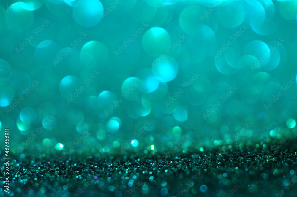 Abstract turquoise color bokeh glitter light blur background Abstract turquoise color bokeh glitter light blur background