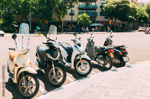Motorbikes, Motorcycles, Scooters Parked In European City