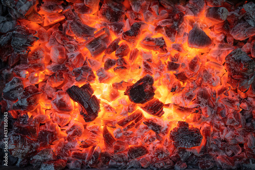 burning coals background. burning charcoal. The fire for the kebab is in a state of embers.