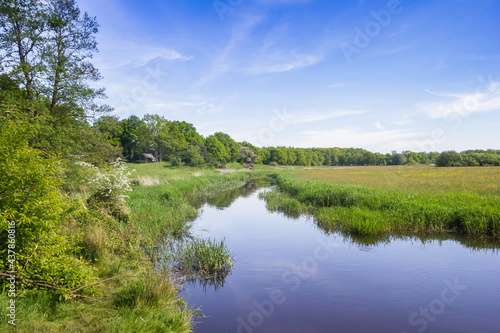 Drenste Aa river flowing through the landscape near Schipborg, Netherlands
