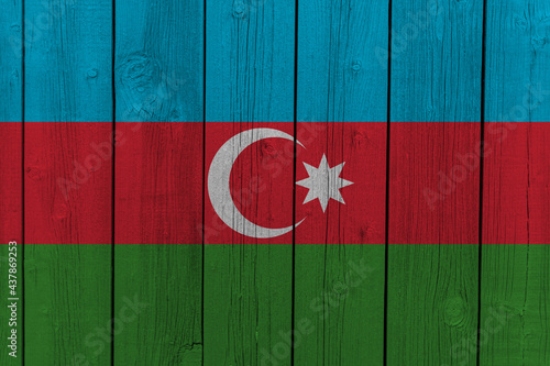 The National Flag of Azerbaijan painted on a wooden wall. 