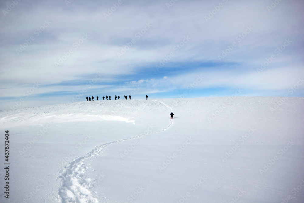 team of alpinism on the ridge of a mountain team of alpinism on the ridge of a mountain