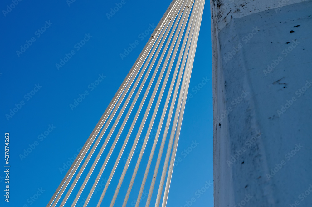 Low angle view of cable-stayed bridge against sky Low angle view of cable-stayed bridge against sky